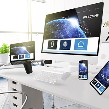 3d rendering mockup of computers, mobile devices and assorted office supplies floating  in mid-air at office showing landing page. Some elements furnished by NASA.